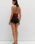 Nagnata Low Rise Micro Denim Short in Washed Black
