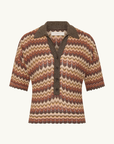 Faithfull Raya polo top in Lais stripe crochet-feel knit with a collared neckline, button placket, and short sleeves.