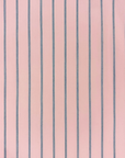 Esmaee Bayview shirt fabric featuring a soft pink base with vertical navy blue pinstripes in a textured cotton weave.