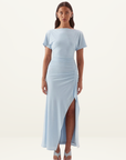 Sovere Vera midi dress in sky blue textured mesh with boat neck, magyar sleeves, gathered waist, and front leg split.