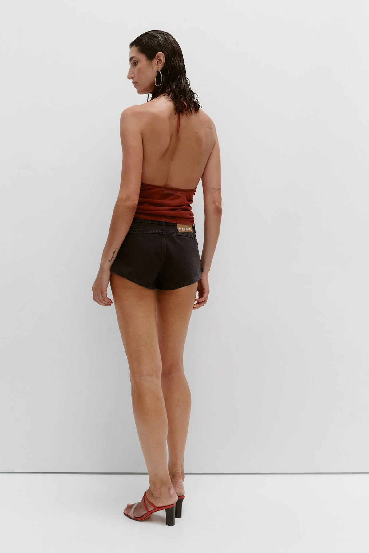 Nagnata Low Rise Micro Denim Short in Washed Black