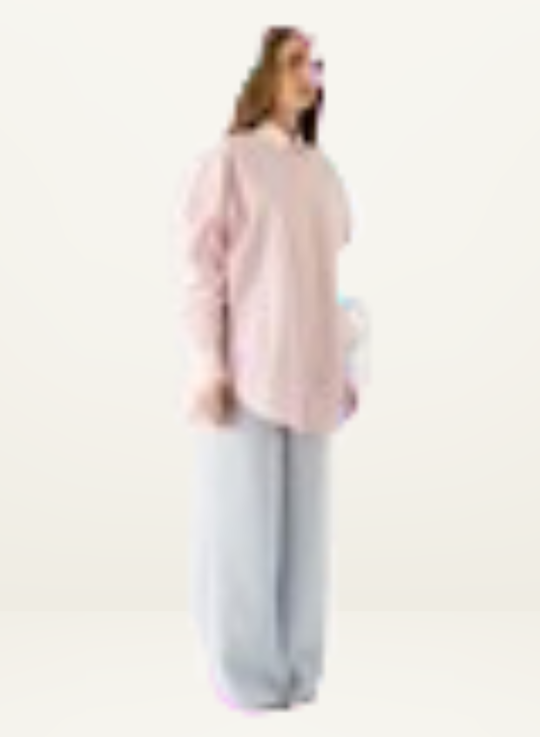 Esmaee Bayview button-down shirt in pink and white vertical stripes paired with light blue wide-leg trousers.