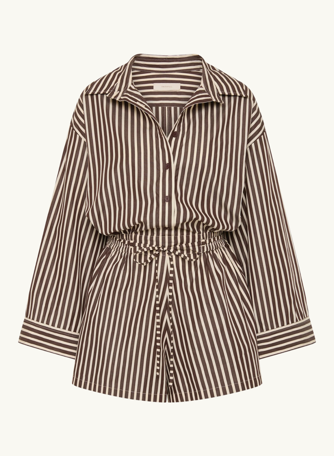 Faithfull Belas cotton playsuit in Rita stripe port with a collared shirt top, button front, and drawstring waist.