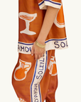 Alemais Soleil D'Amour Silk Tapered Pant in RUST
