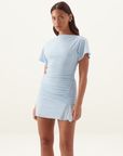 Sovere Vera sky blue mini dress in textured mesh with magyar sleeves, gathered waist, and side godet detail.